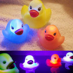 1 Pcs Cute Duck Bath Toys LED Water Induction Luminous Duck Floats Shower Fun Play Animal Pool Toys Children Bath Toys